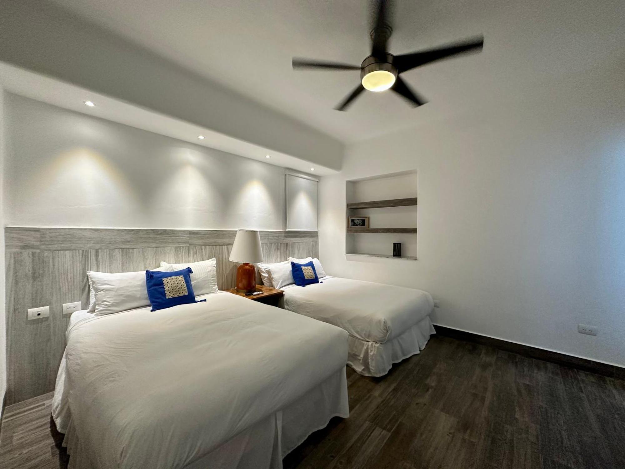 Master Suite 2 Double beds - Lagoon View,1546941451:JPEG