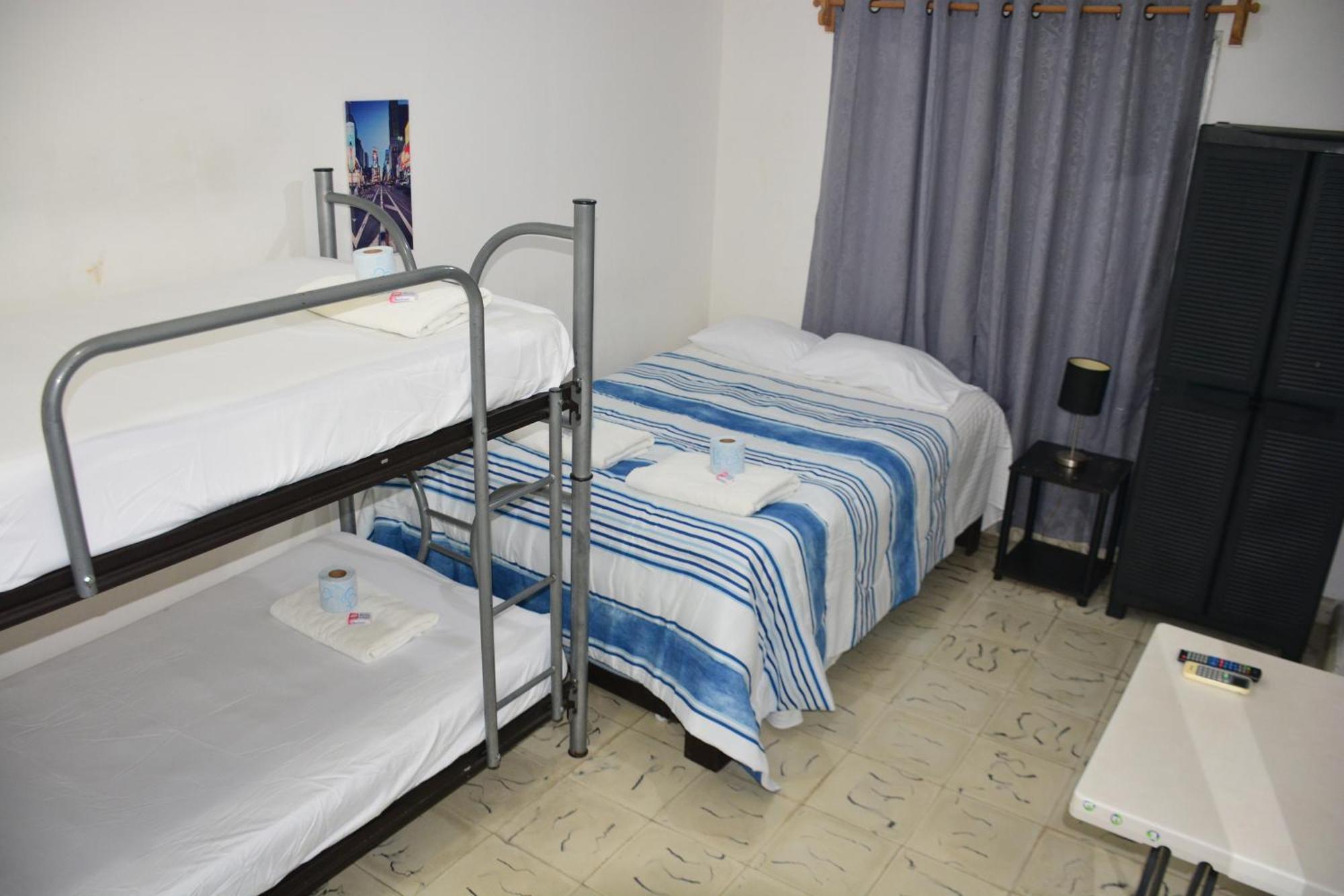 Camera Quadrupla con Bagno in Comune