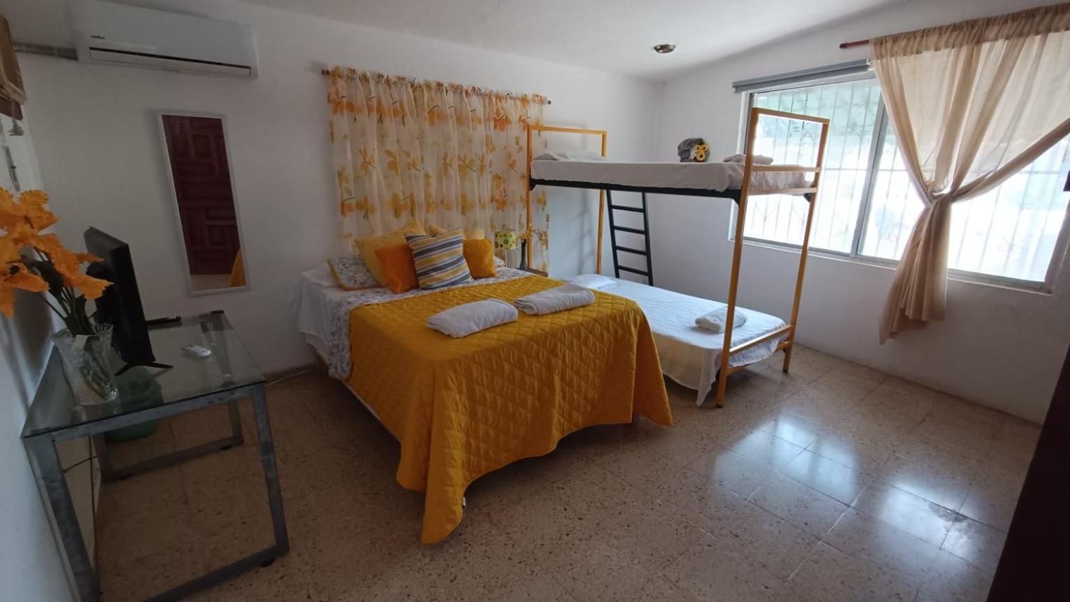 Camera Quadrupla con Bagno in Comune
