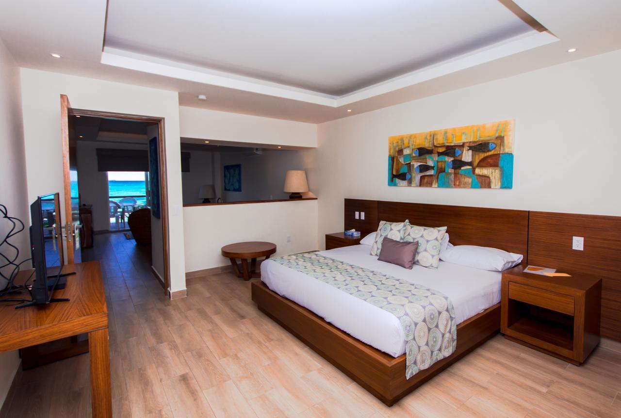Master Suite met Kingsize Bed en Uitzicht op Zee